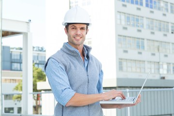 Poster - Confident male architect using laptop