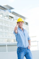 Poster - Smiling male architect gesturing thumbs up