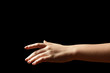 © Africa Studio - Female hand on dark background