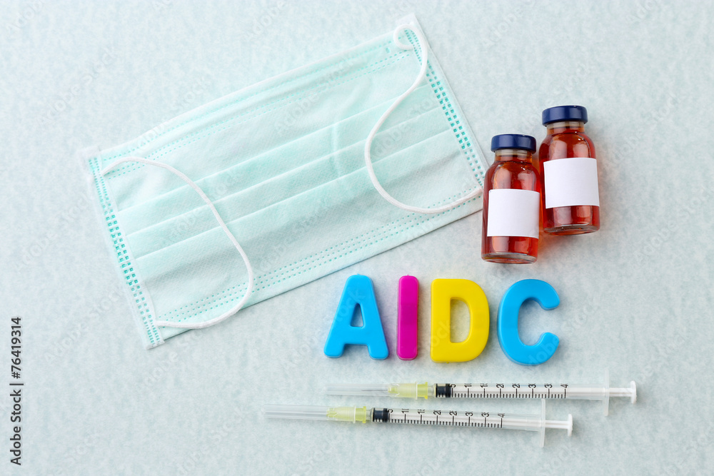 Medicines with word Aids on light background