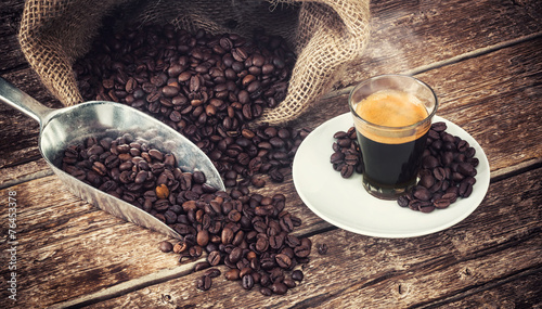 Plakat na zamówienie Espresso coffee in glass cup with coffee beans.