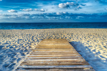 Wooden Boardwalk On The Sand In Hdr