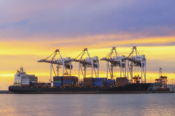 Wall Mural - Container Cargo freight ship with working crane loading 