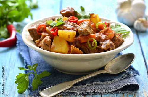 Fotografie, Obraz Meat stewed with vegetable in spicy tomato sauce.