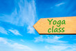 Arrow sign with Yoga Class message