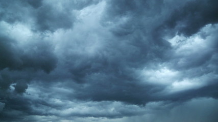 Wall Mural - Lightning during a thunderstorm. Storm clouds are moving fast on