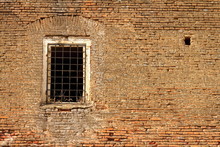 Window On Old Abandoned Castle Wall