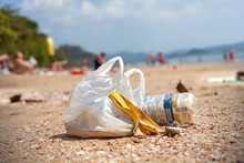 Garbage On A Beach, Environmental Pollution Concept Picture.