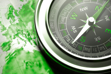 Wall Mural - Compass on map background