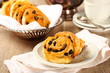Fresh gluten free sweet swirl buns with raisins