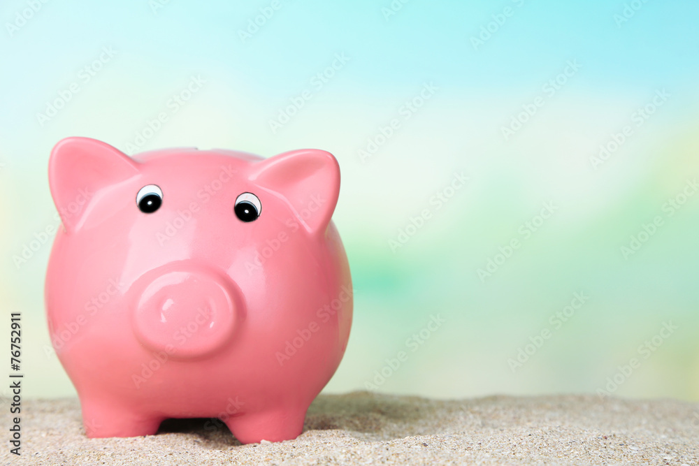 Piggy bank on the beach