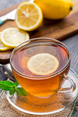 Cup of tea with mint and lemon