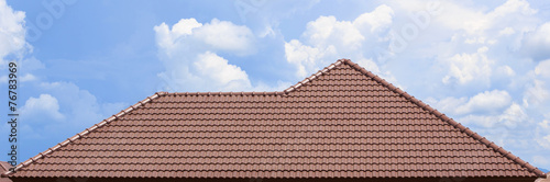 Fotografie, Obraz roof under construction with stacks of roof tiles for home build