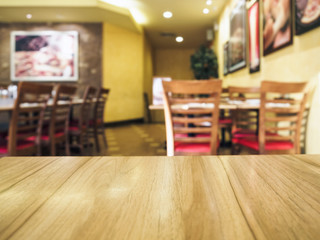 Wall Mural - Wooden Table top with Restaurant Background