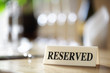 Reserved sign on restaurant table