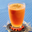 Sea buckthorn, apple and carrot smoothie with pollen