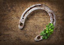 Old Rusty Horseshoe And Four Leaf Clover