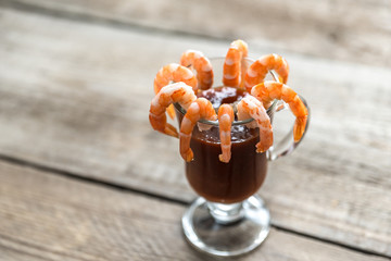 Sticker - Cooked prawns  with tomato sauce on the wooden table