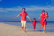 © nadezhda1906 - family with kids having fun on tropical beach