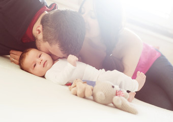 Wall Mural - Parents with little baby at home