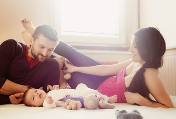 parents with little baby at home