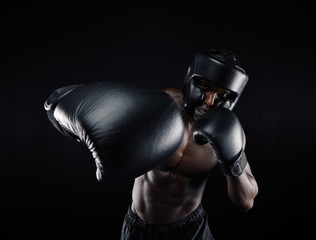 Wall Mural - Young sportsman training boxing