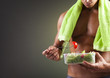 © cristovao31 - Strong man holding a bowl of fresh salad on dark background
