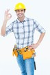 © WavebreakMediaMicro - Handyman gesturing OK sign