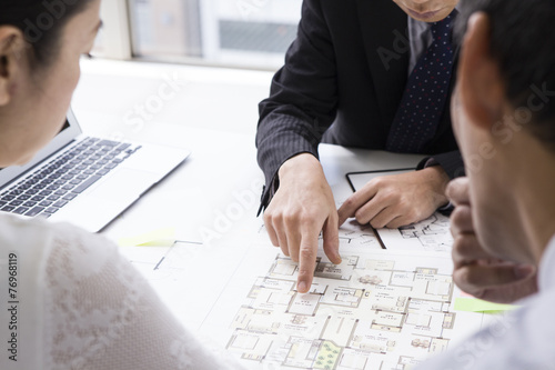 Fotografie, Obraz Couple who are considering a real estate investment