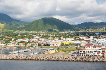 Wall Mural - Colorful St Kitts Under Green Hills