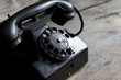 © udra11 - Old retro telephone on vintage boards