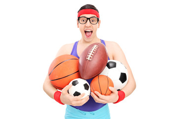 Canvas Print - Nerdy guy holding a bunch of sports balls