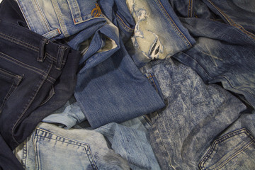 Jeans are beautifully detailed blue, dark blue and black