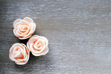 Wooden Background With Pink Roses