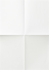 Wall Mural - white sheet of paper folded in four