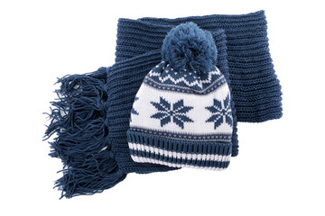 Wall Mural - Winter bobble ski knit hat and scarf blue isolated white background photo