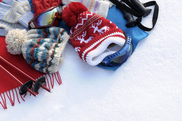 Sticker - Winter sports background ski skiing equipment and clothes in snow photo