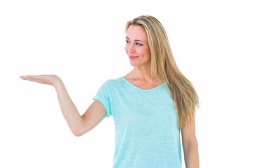 Poster - Pretty blonde smiling with hand out