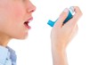 © WavebreakMediaMicro - Close up of a woman using an asthma inhaler