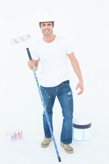 Aufkleber - Portrait of happy man holding paint roller