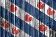 flag of Friesland painted on wooden frame