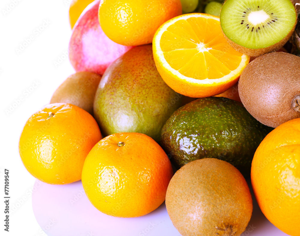 Assortment of exotic fruits isolated on white