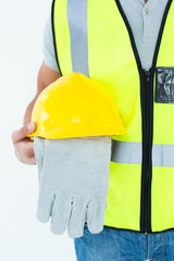 Poster - Construction worker holding gloves and hardhat