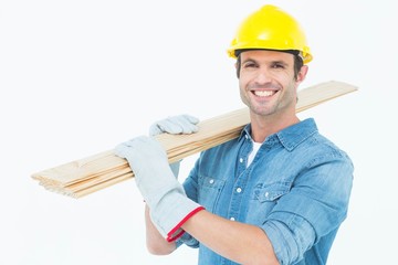 Poster - Happy carpenter carrying wooden planks