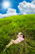 Business woman lying Tablet meadow