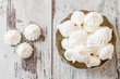 Vanilla meringue cookies  on White Wooden Background