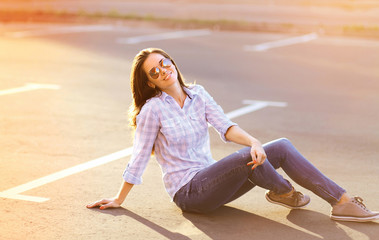 Pretty happy sensual woman outdoors in sunny day