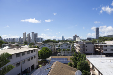 Kapahulu town in Honolulu with homes, condos, and mountains of T