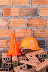  construction helmet safety and cone in construction site