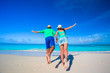 © travnikovstudio - Young happy couple during tropical beach vacation